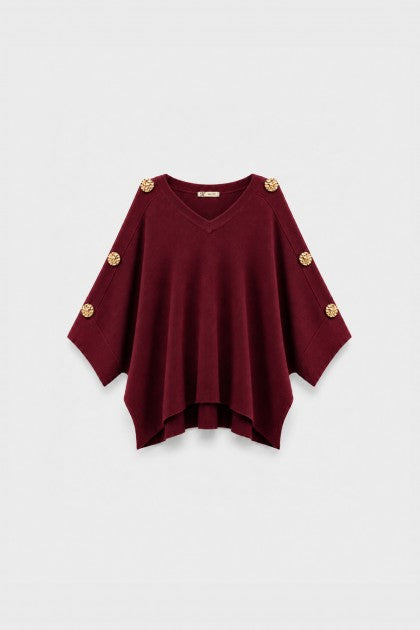 JERSEY DE PUNTO CON APLIQUES DORADO