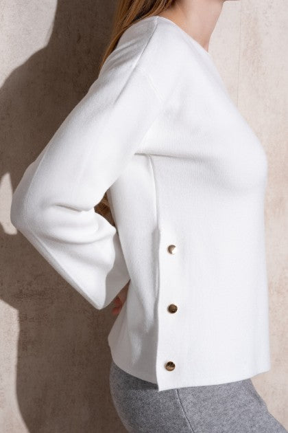 SUÉTER DE PUNTO CON BOTONES