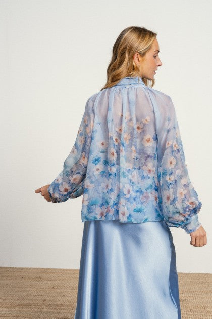 BLUSA CON FLORES Y LAZO